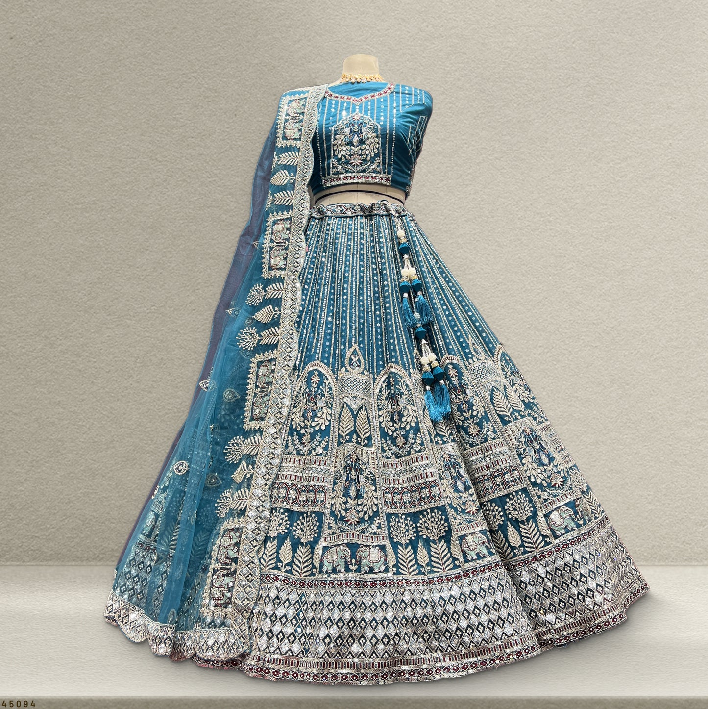 Cherry Blossom - The Elephant Peacock Partywear Designer Lehenga Blue Color