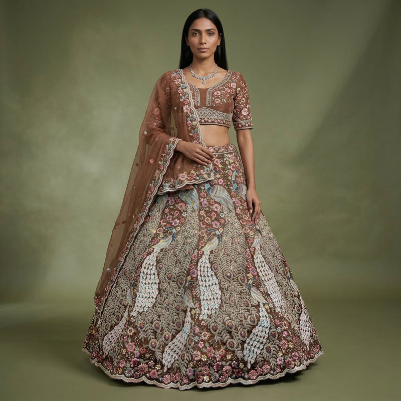 Rust embellished lehenga set with peacock motif and floral sequin trim