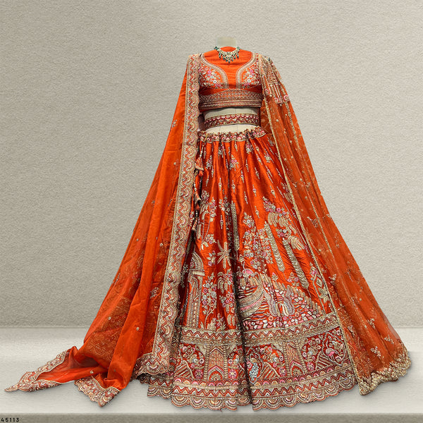 Dulhan in Orange Rust Bridal Lehenga : Double Dupatta Raw Silk Flared Lehenga