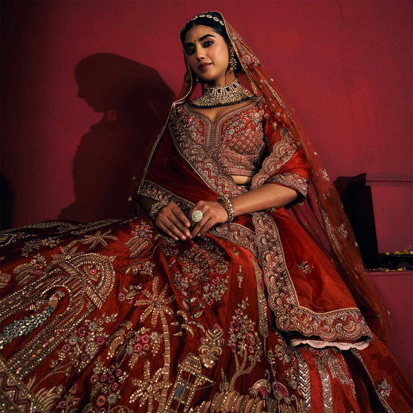 Dulhan in Orange Rust Bridal Lehenga : Double Dupatta Raw Silk Flared Lehenga