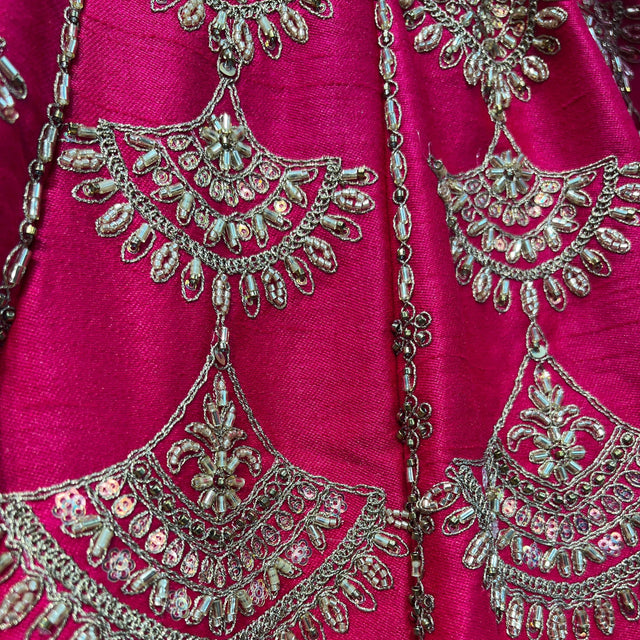 Pink lehenga bodice with ornate silver and turquoise bead work