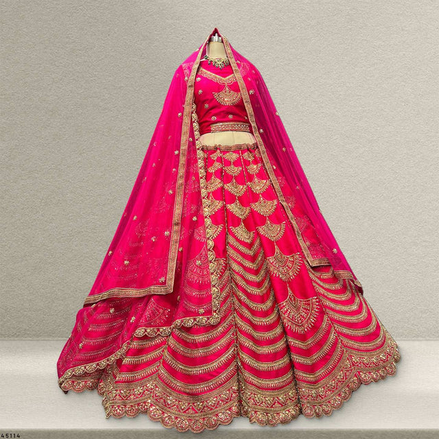 Pink bridal lehenga with gold embroidery, flared skirt and sheer dupatta set