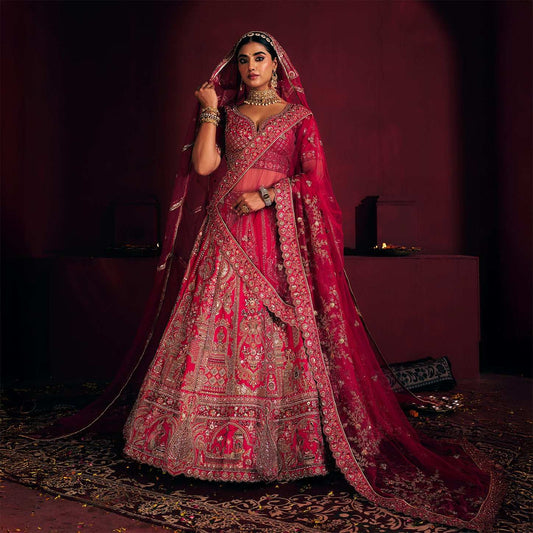 Dulhan in Rani Pink elegance : Storytelling Bridal Lehenga With Veil Dupatta