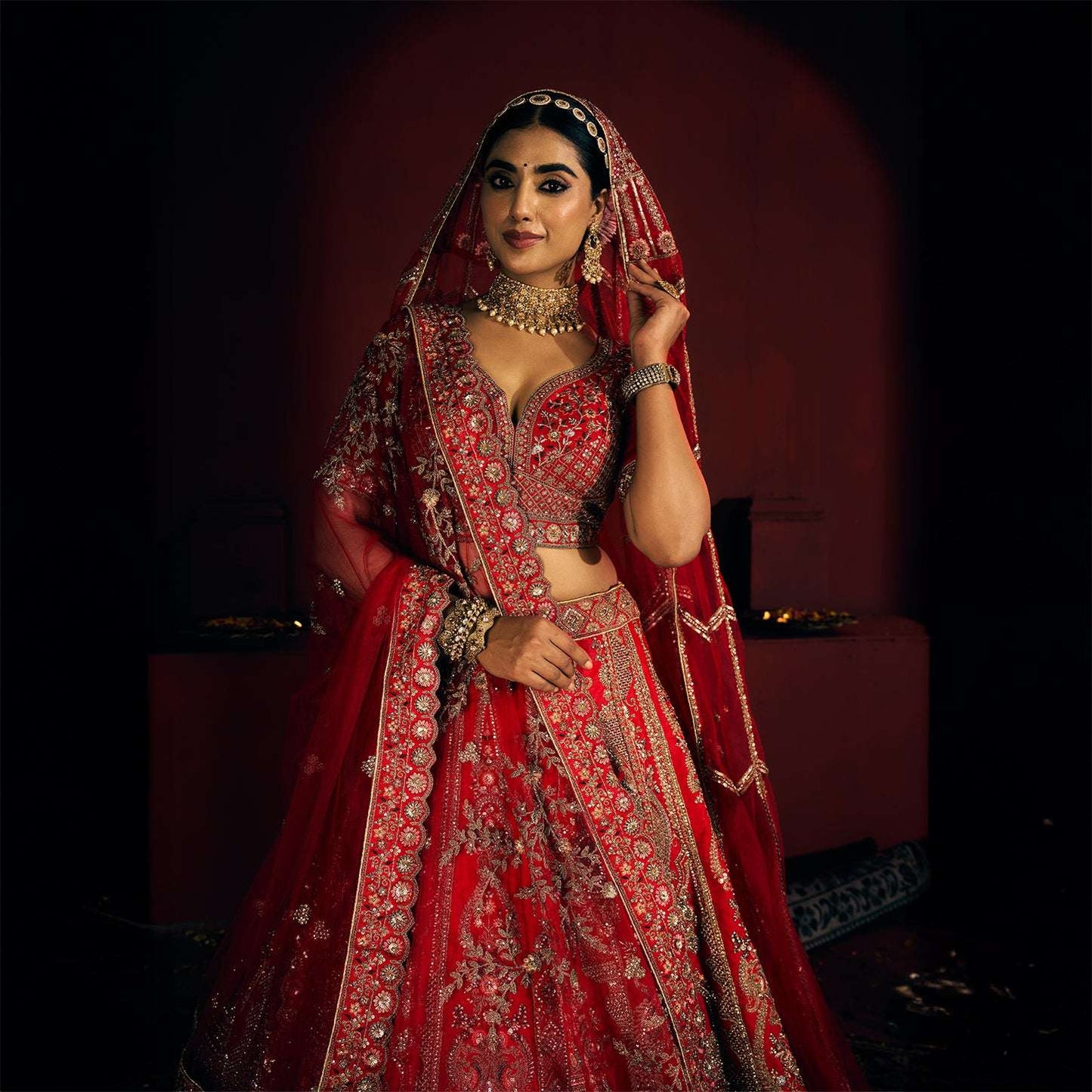 Dulhan in Royal Red Bridal Lehenga : Storytelling Wedding Lehenga With Veil Dupatta