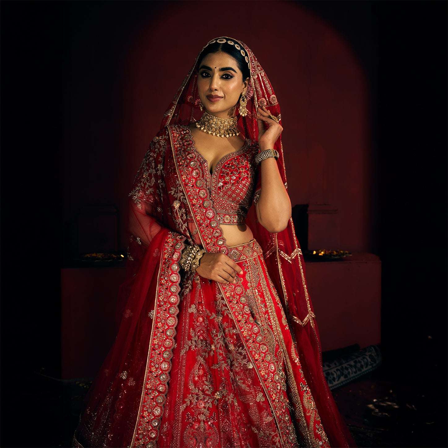 Dulhan in Royal Red Bridal Lehenga : Storytelling Wedding Lehenga With Veil Dupatta
