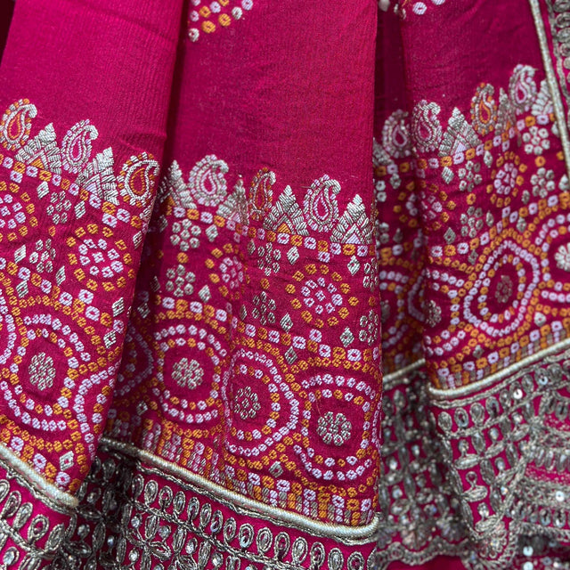 Rani pink fabric with gold and magenta embroidery border and beadwork trim