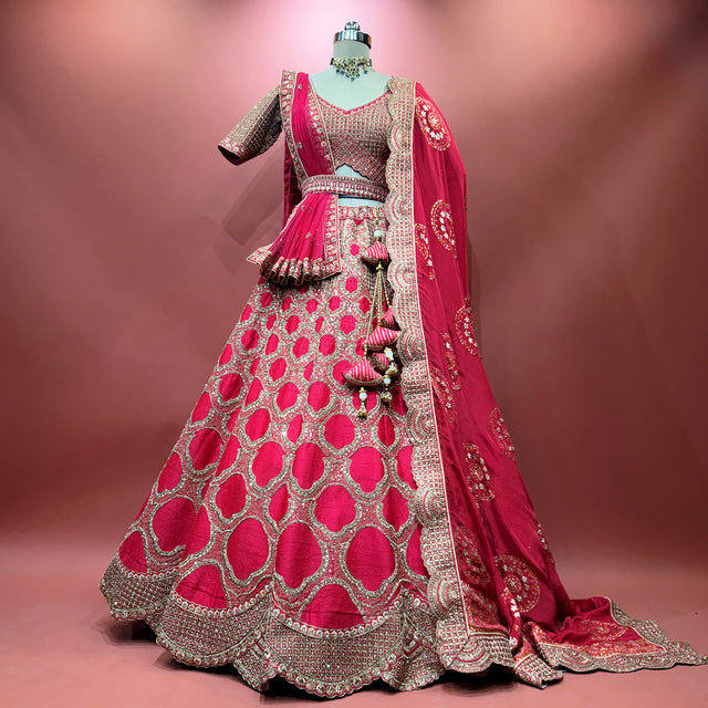 Rani pink bridal lehenga with silver sequin embroidery and flared skirt, two dupattas