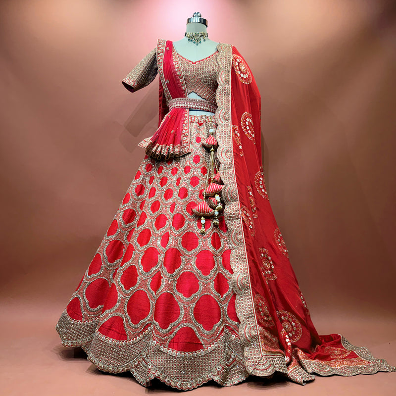 Royal red bridal lehenga with silver pattern and flowing dupatta, flared skirt