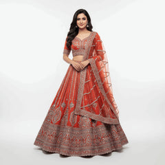 Orange rust embroidered bridal lehenga with flared skirt and double sheer dupatta set