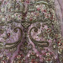 Lilac net lehenga fabric with dense palace-style embroidery and sequins