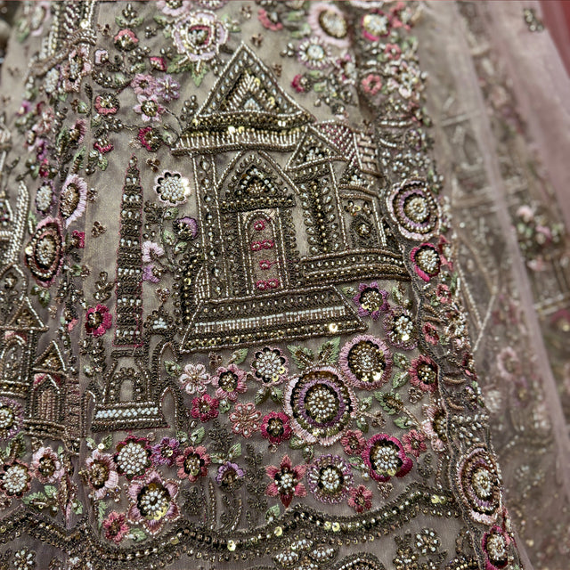 Embroidered champagne net bodice detail with multicolor stones and palace motifs