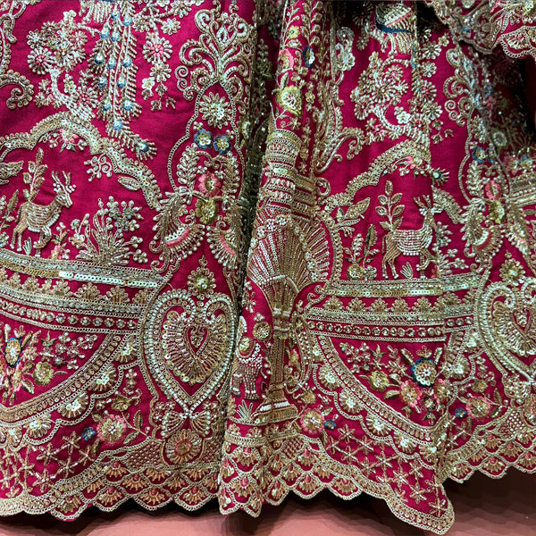 Embroidered bridal lehenga hem in rani pink with ornate gold cutdana and zardosi