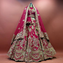 Rani pink bridal lehenga with heavy gold cutdana and zardosi, double dupatta