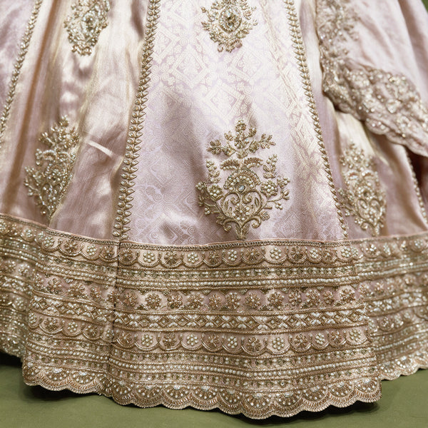 Baby pink lehenga skirt with gold embroidered border and scalloped hem