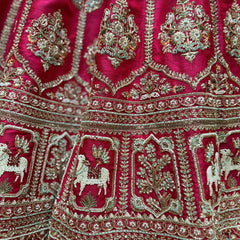 Amrapali - Rani Pink Raw Silk Bridal Lehenga with Cow Motif Border and Double Net Dupatta