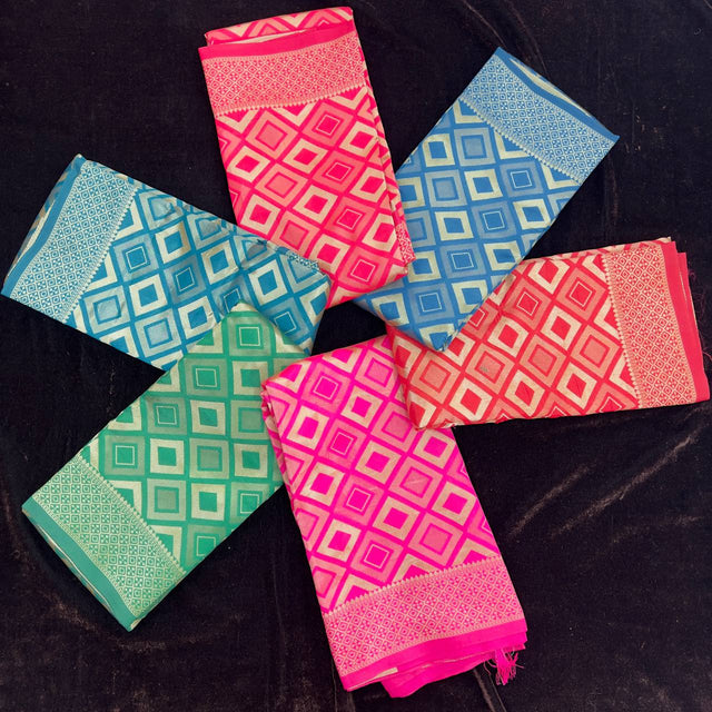 Art silk Banarsi saree folds with geometric diamond pattern in pink, blue, and green
