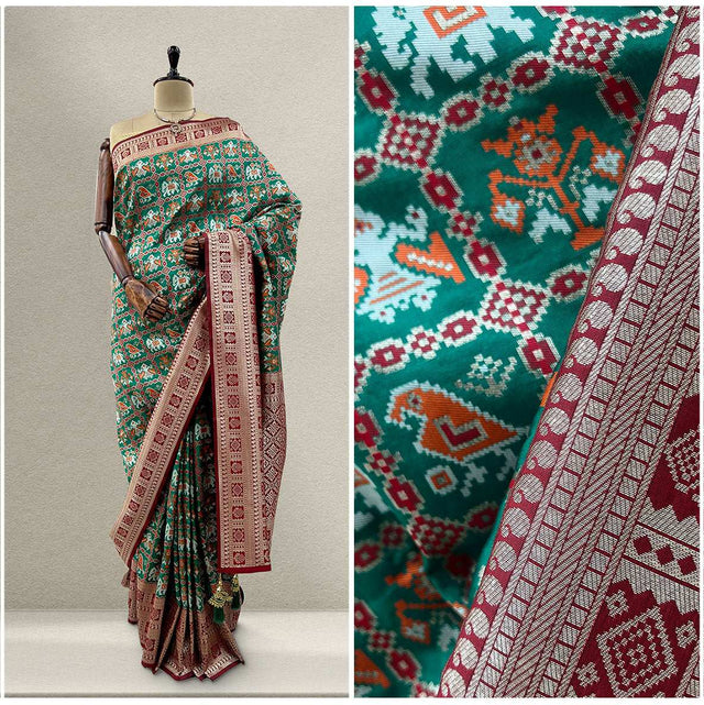 Green and maroon patola silk saree close-up of geometric motifs and woven border