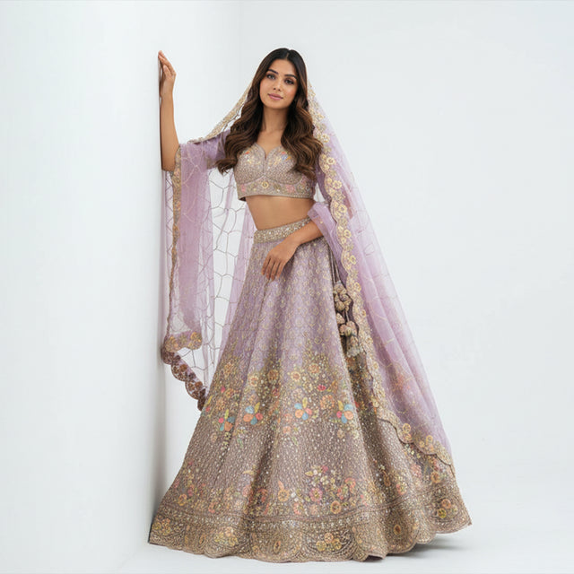 Embroidered lilac lehenga set with floral gold motifs, short blouse and sheer dupatta