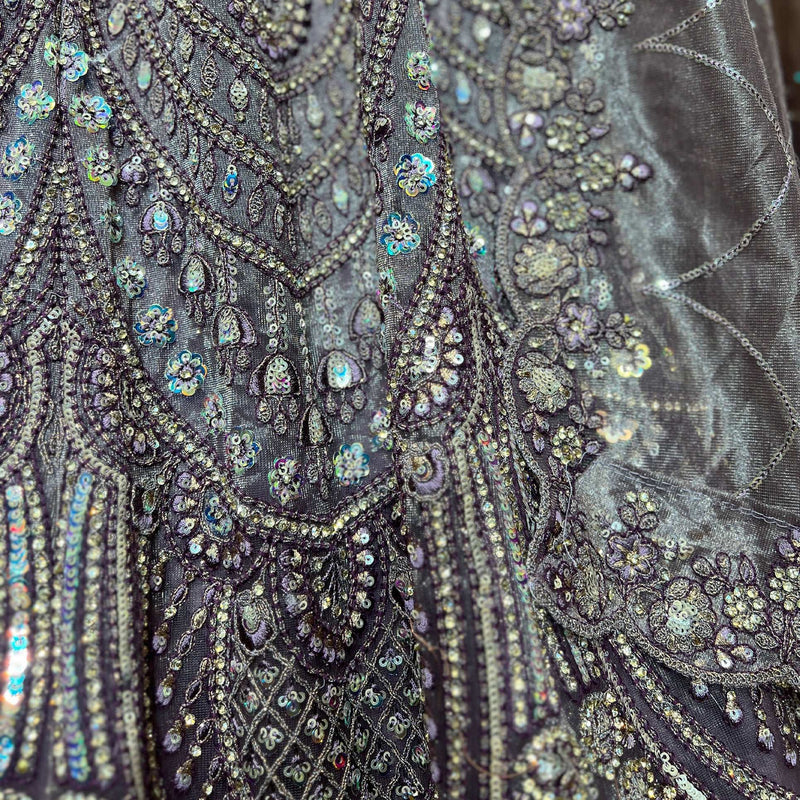 Detailed sequin and bead embroidery on deep purple lehenga bodice with floral motifs