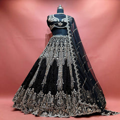 Black net lehenga with golden cutdana and pearl embroidery, scalloped hem and net dupatta