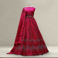 Pink sequined net lehenga with stonework bodice and flared embroidered skirt, sheer dupatta
