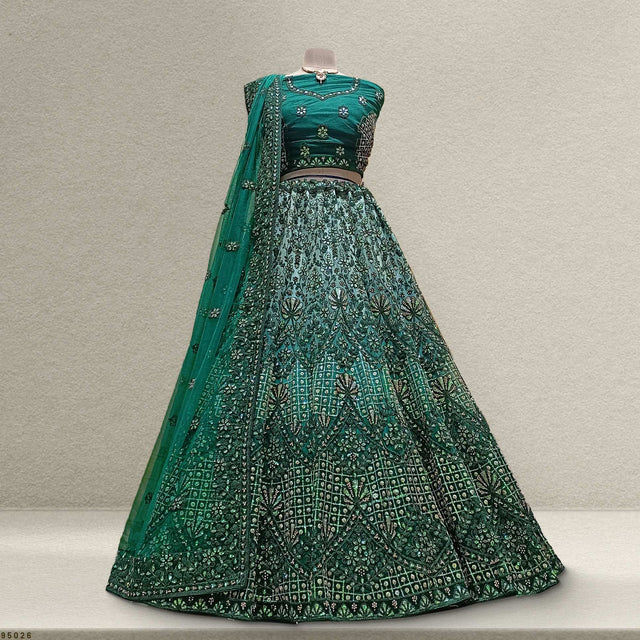 Green sequined net lehenga with ornate allover motifs and embellished waistband
