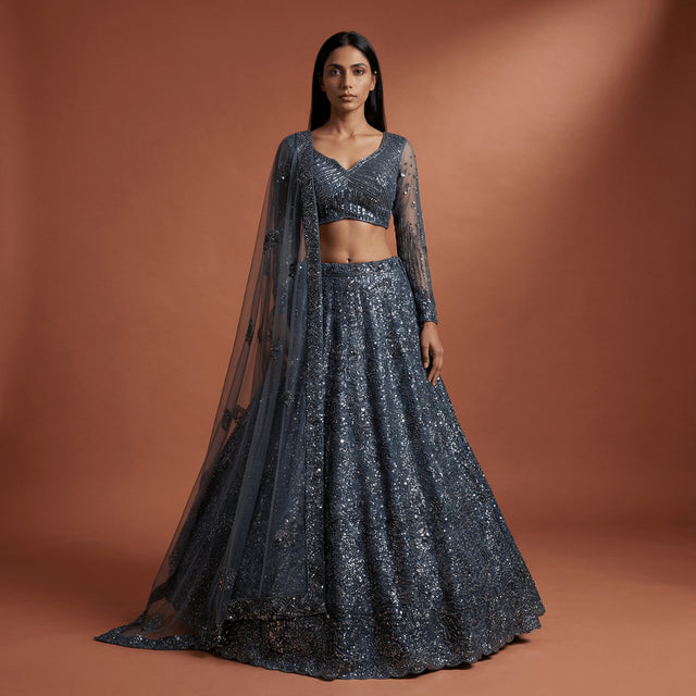 Dark grey sequin lehenga set with sheer long sleeves and V-neck blouse