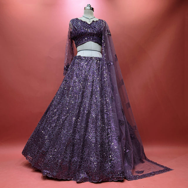 Dark wine sequined reception lehenga with short-sleeve blouse and sheer cape