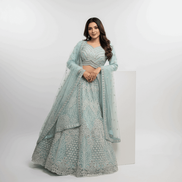 Sky blue long-sleeve lehenga with layered flare skirt and sheer dupatta