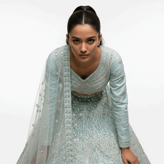 Sky blue beaded lehenga with V-neck bodice and sheer embroidered dupatta
