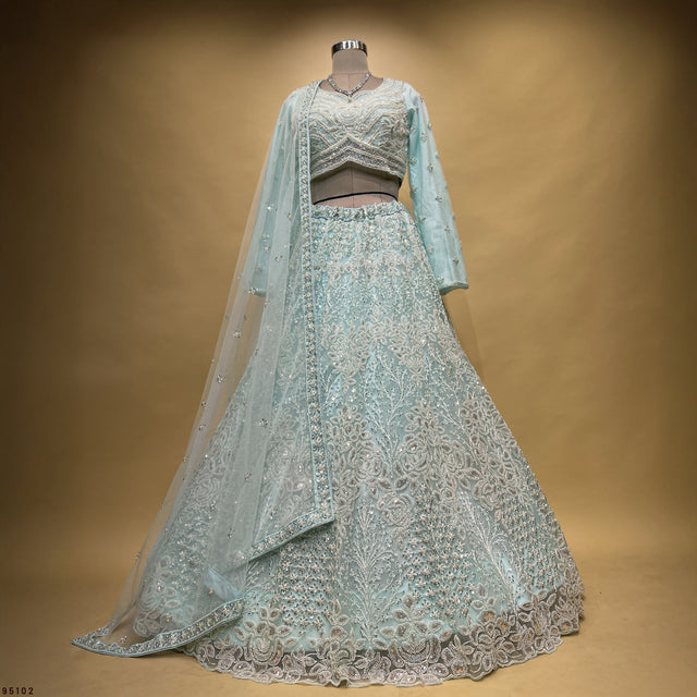 Sky blue beaded lehenga with sheer dupatta and ornate embroidered skirt