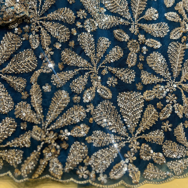 Beaded embroidery on navy blue lehenga skirt, ornate floral pattern