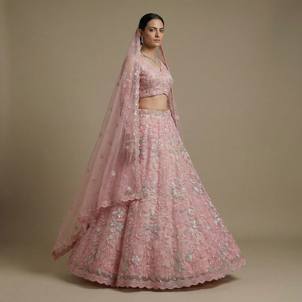 Soft pink lehenga set with beaded pearls, tiered skirt and sheer dupatta
