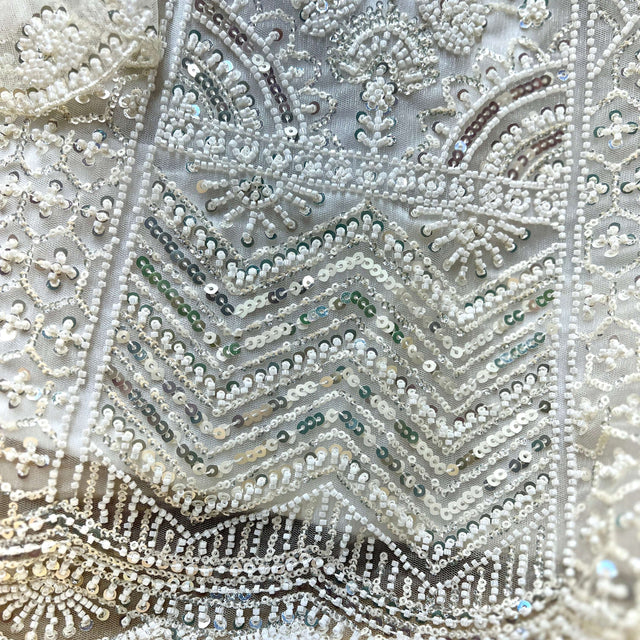 Off-white embroidered lehenga fabric with zigzag bead and pearl work
