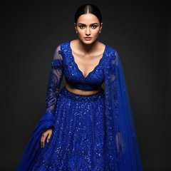 Blue lehenga with sequin detailing, cropped blouse, and draped sheer dupatta