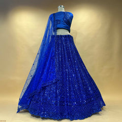Jazzagals royal blue sequin lehenga with fitted blouse and sheer drape