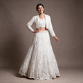 White net lehenga with beaded cropped jacket and handwork blouse, Indo-Western look, worn