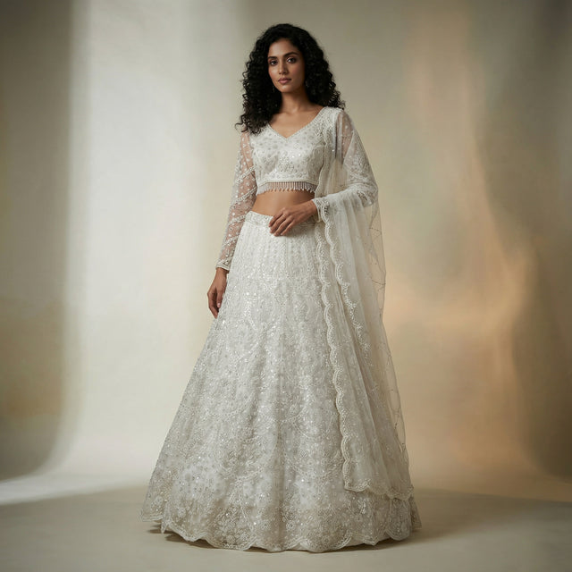 Ivory beaded lehenga set with cropped blouse, flared skirt, sheer embroidered dupatta