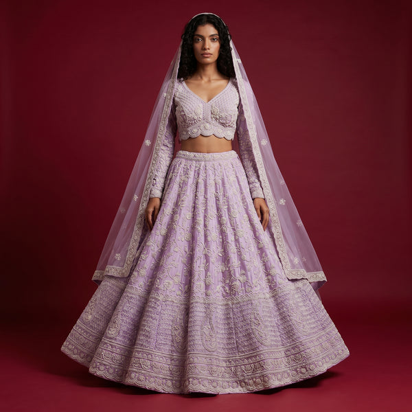 Lavender lehenga with full-sleeve blouse and embroidered dupatta, tiered skirt