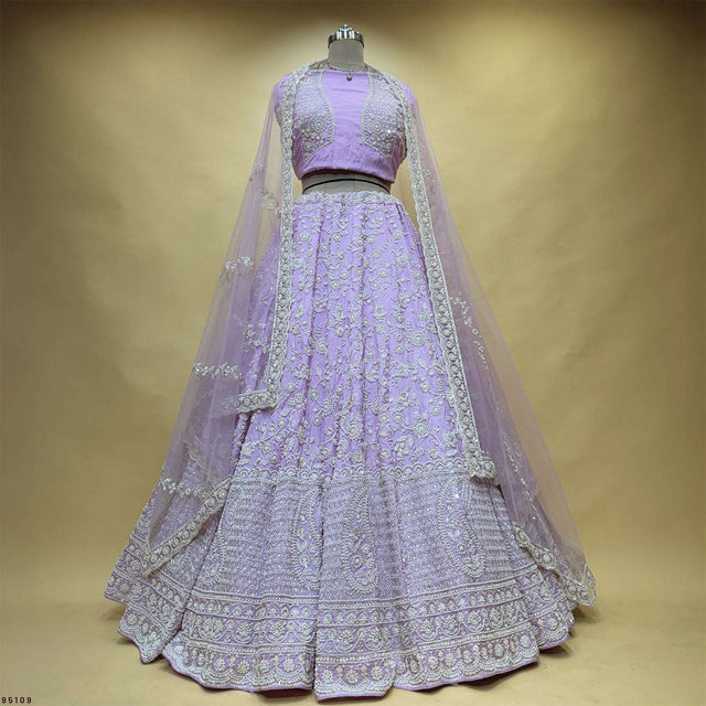 Lavender lehenga with full-sleeve blouse, tiered skirt, embroidered dupatta