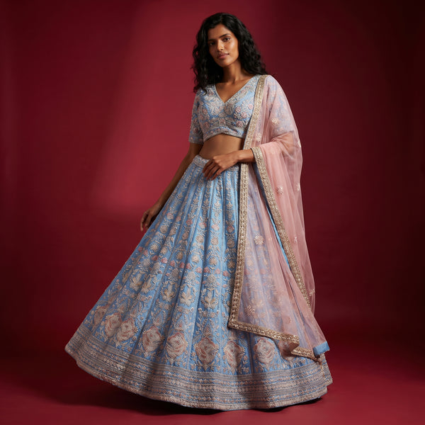 Blue embroidered lehenga with cropped blouse and sheer matching dupatta