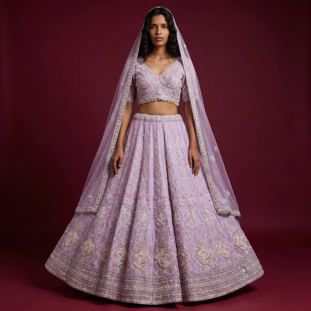 Lavender lehenga set with embroidered blouse and flared skirt with dupatta
