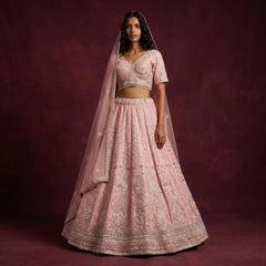 Pink embellished lehenga with cropped blouse and matching sheer dupatta