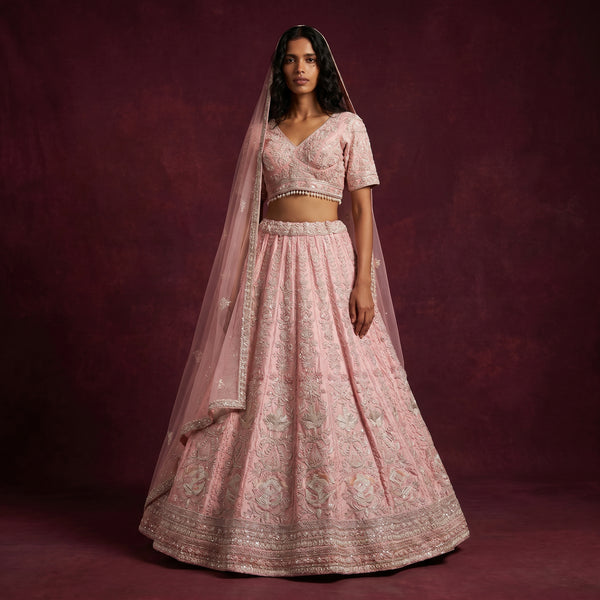 Pink embellished lehenga with cropped blouse and matching sheer dupatta