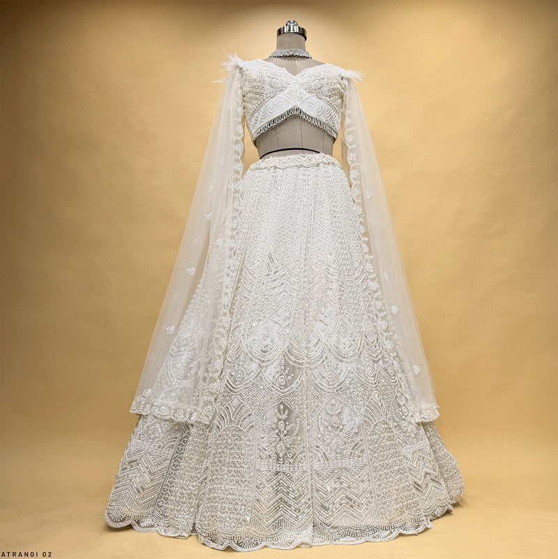 Celestial Collection: Off White Handwork Reception Net Lehenga with Cape Style Sleeves