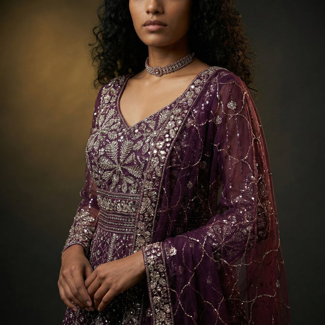 Embroidered wine purple party gown with V-neck and long sleeves, silver detailing