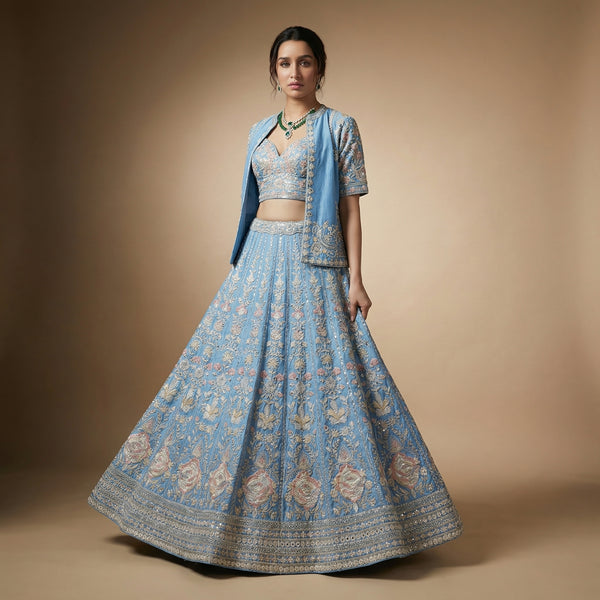 Light blue embroidered lehenga with jacket-style blouse