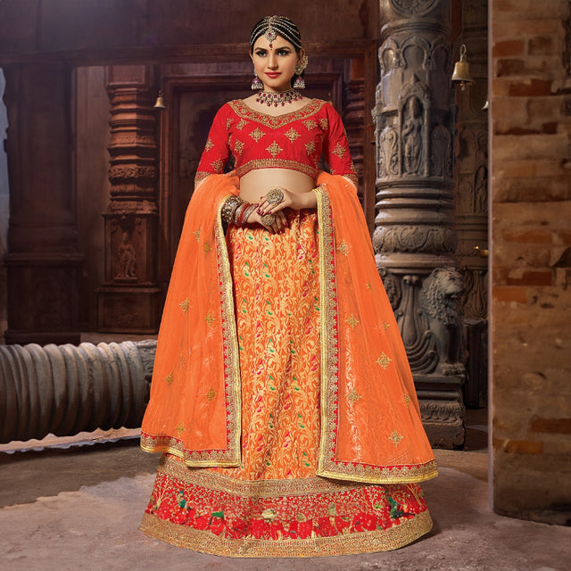 Festive red and orange lehenga with gold embroidered blouse and border trim