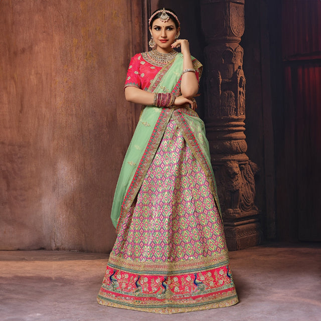 Onion pink Banarasi silk lehenga with pista green dupatta, gold border and woven motifs