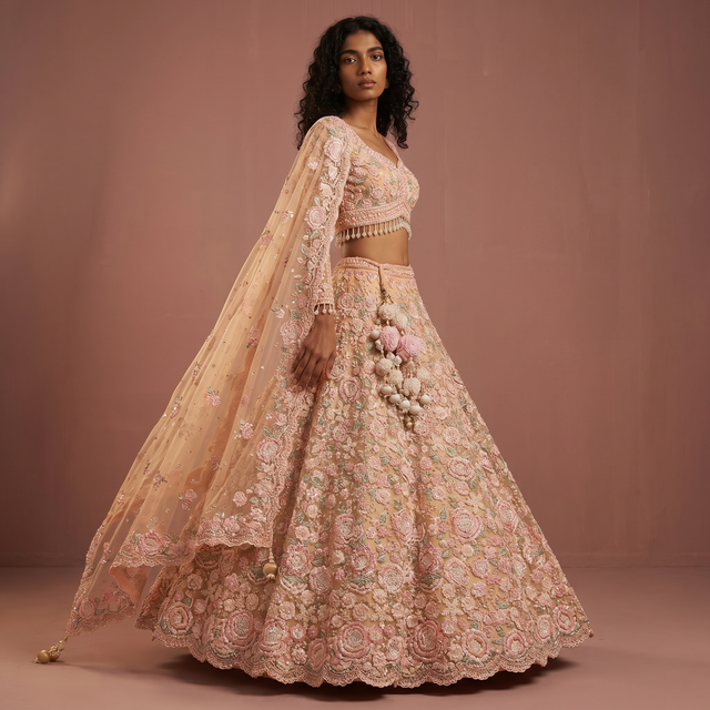 Pastel floral lehenga set with embellished blouse, flared skirt, and sheer dupatta